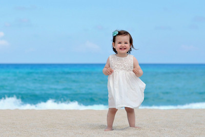 31% OFF on Child's Love - Smiling Girl on the Sea Shore Paper Print